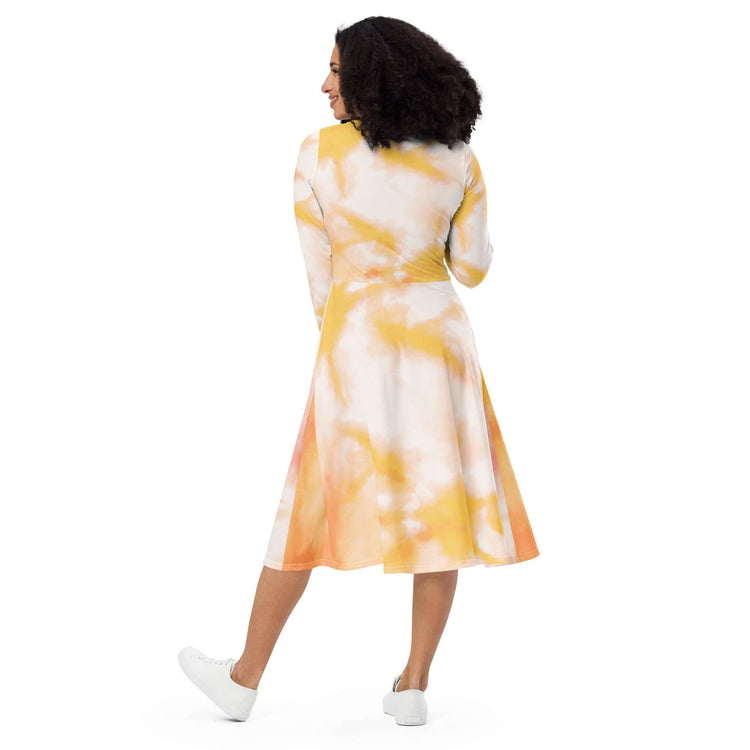 Charming tie-dye midi dress in vibrant yellow and orange, showcasing flared hem and long sleeves from the back.